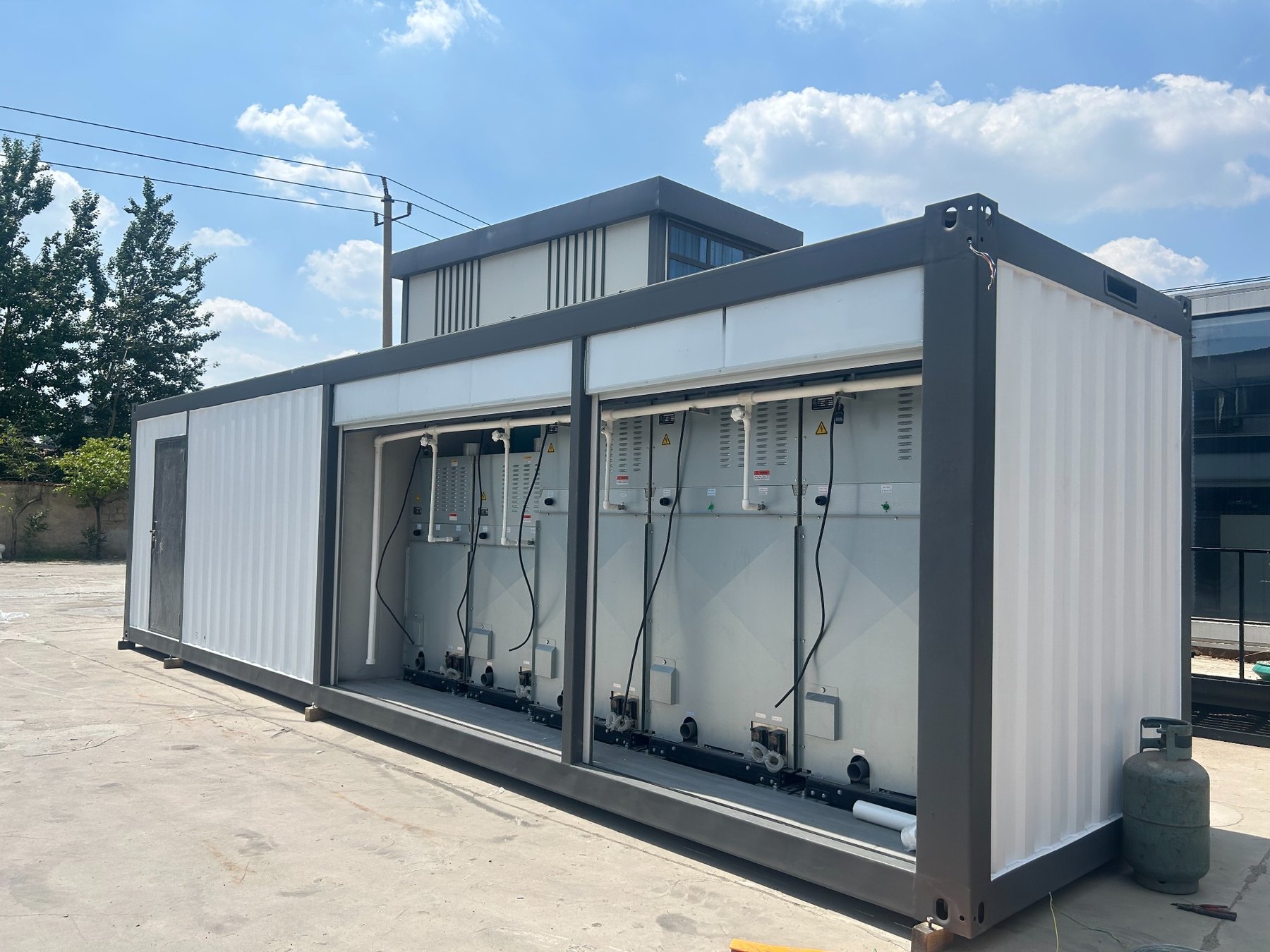 Containerized laundry room utility side